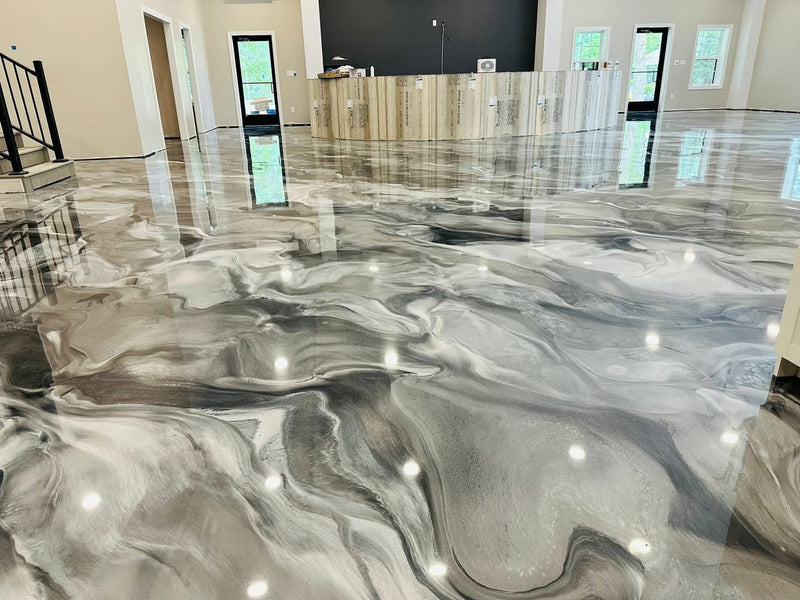 Gray and silver metallic epoxy floor in an open-concept home