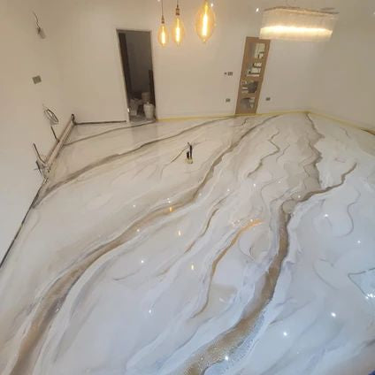 White and pearl marbled metallic epoxy floor with copper vein accents